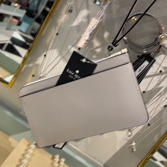 Kate Spade Lucy Medium L-Zip Wristlet 
COLOR: Platinum Grey Multi 
NWT - Picture 11 of 16